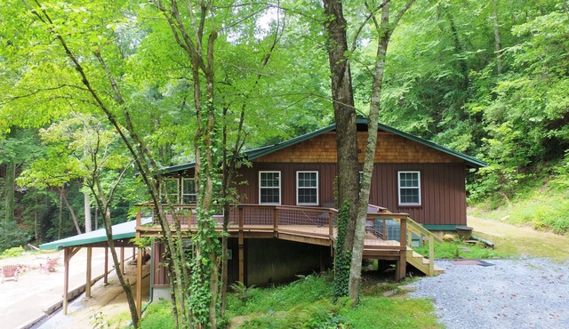 Secluded cabin surrounded by mountains, waterfalls, wildlife, and 50,000 acres
