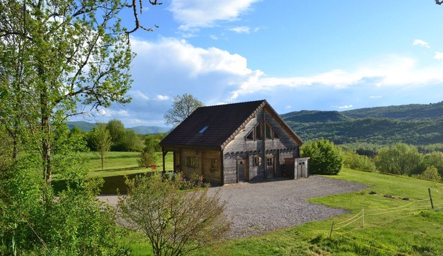 Secluded chalet in the sun with breathtaking views of a wooded valley