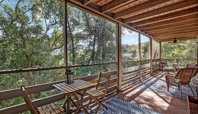 Secluded Condo with Peaceful Wooded Views and Easy Access to the Beach by RedAwning