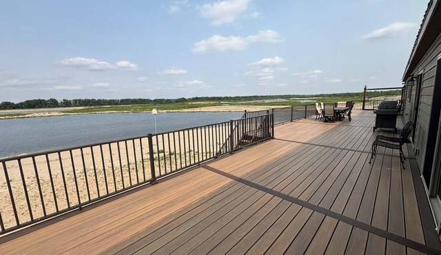 Secluded Elkhorn River Retreat. Full sized home overlooking 250+ acre lake.