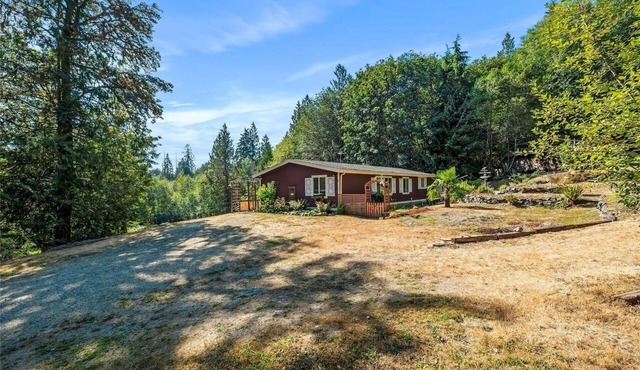 Secluded forest retreat and pond