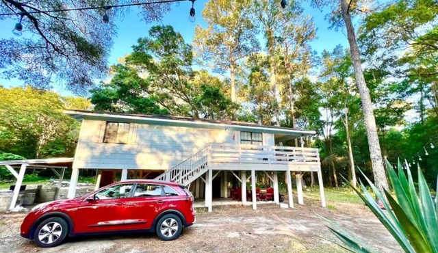 Secluded Forest Stilts House with Balcony, Fire Pit & Nature Views