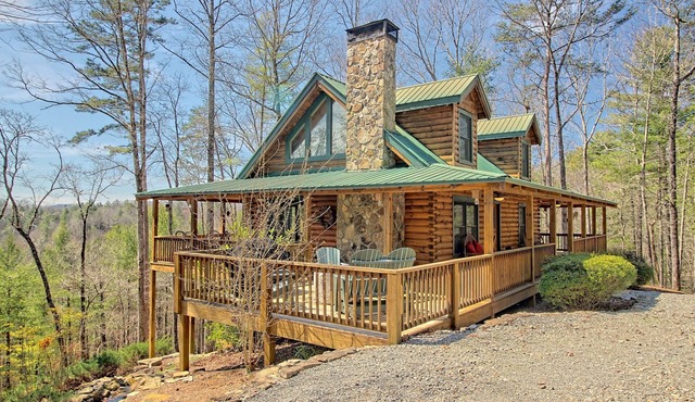 Secluded home on acreage with private hot tub, fireplace & wraparound deck