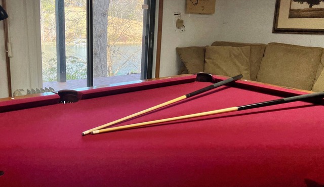 Secluded lakefront bliss with a private deck, pool table, and ping pong!