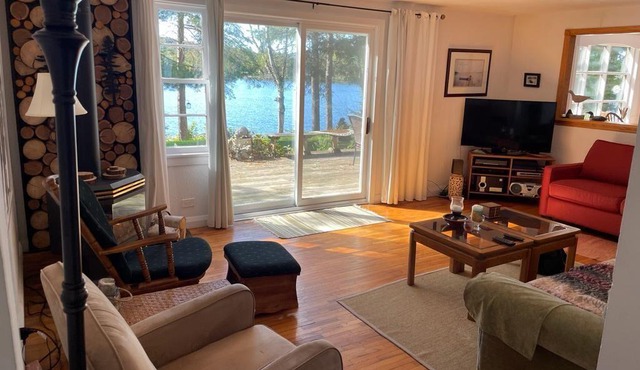 Secluded Lakefront Escape on 1.5 Acres of Pristine Waterfront