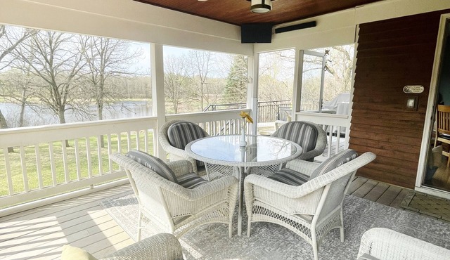 Secluded Lakefront Home with outdoor hot tub, fire pit & indoor Hockey Rink