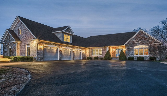 Secluded lakefront home with elevator, dock, private saltwater pool & hot tub