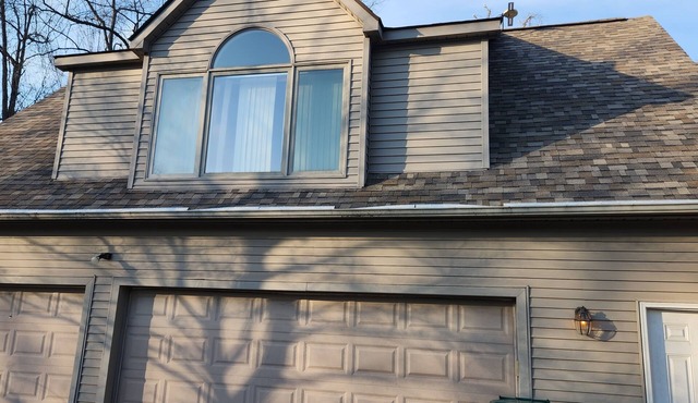 Secluded mother in law suite above garage with 2 private entrances.