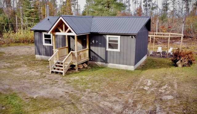 Secluded Rustic Cabin with Hot Tub Near Pere Marquette River in Big Rapids, Michigan