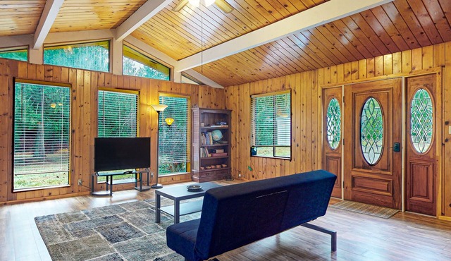 Secluded, single-level getaway with a large yard, gas fireplace, & dog friendly