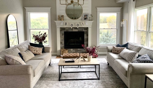 Secluded, spacious, hilltop acreage home with stunning views of Omaha skyline