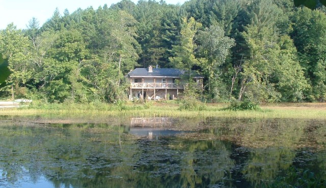 Secluded Stone House 50' deck overlooking Beaver Lake on Ozark Mushroom Farm!