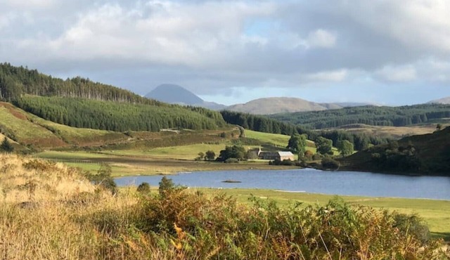 Secluded traditional Island house surrounded by river and wild flower meadows