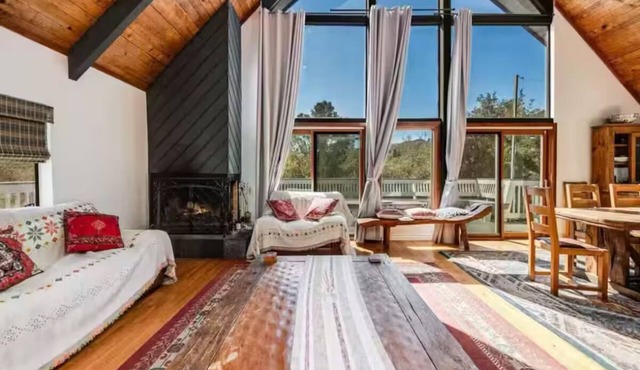 Secluded treetop retreat in Topanga, California, w/wraparound deck. Gated, 5 BDR