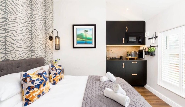 Second floor compact studio with mini kitchen