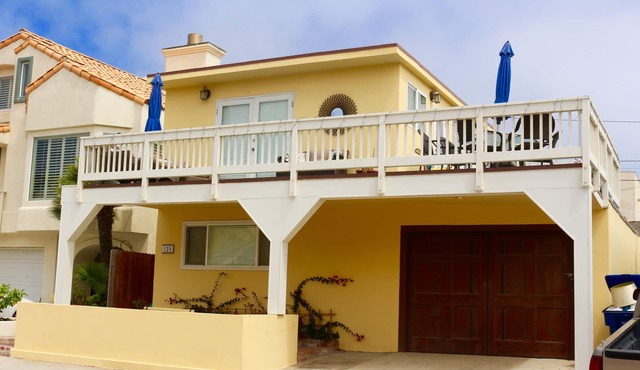 See and hear the ocean from this beautiful beach house steps from the beach.