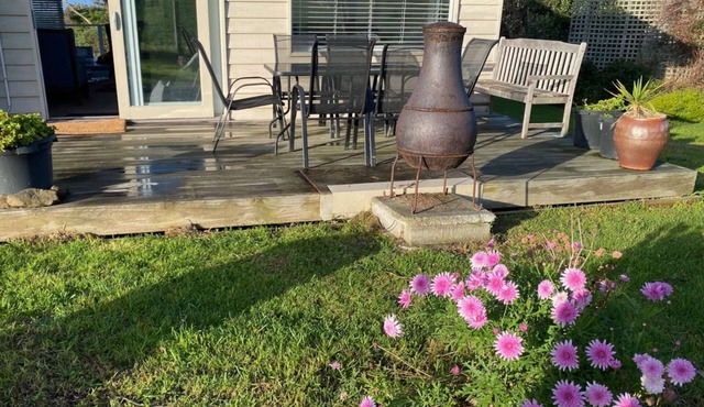 Self-Contained Double Storey Beach House Across the Road from the Beach with Incredible Ocean Views.