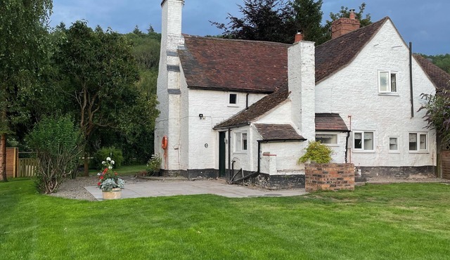 Semi-detached cottage set on the banks of the River Severn near to Ironbridge