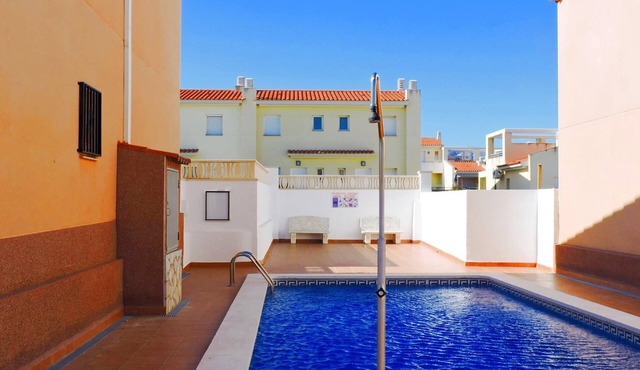 Semi-detached house with community pool in Miami Playa 400 meters from the sea