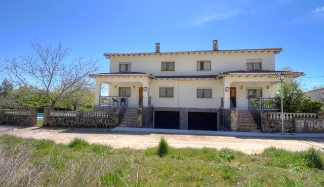 Semi detached houses with swimming pool and barbecues