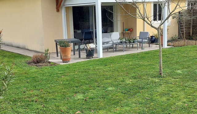 Semi-detached house in the countryside garden covered terrace