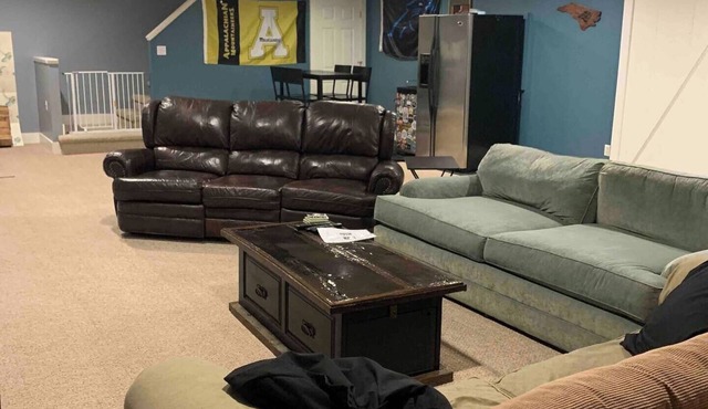 Semi-Private Large Guest Suite; bedroom, bath, and living room in Triad