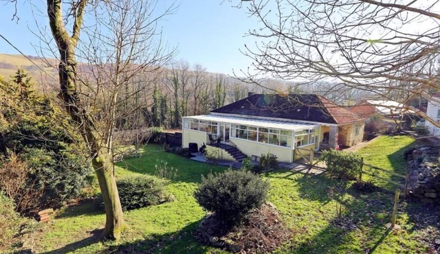 Semi Rural, quirky and spacious, with games room/conservatory and large garden.