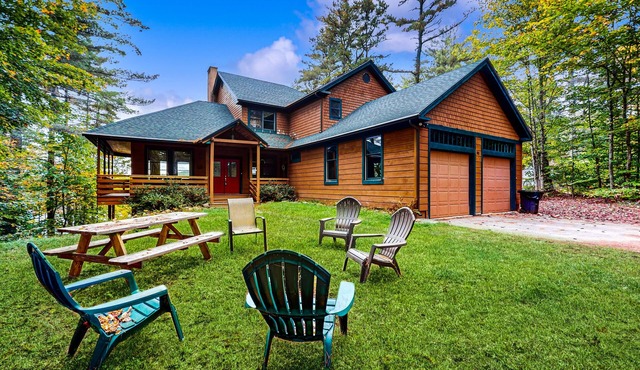 Sensational lakefront retreat with private beach, firepit, wood fireplace, & W/D