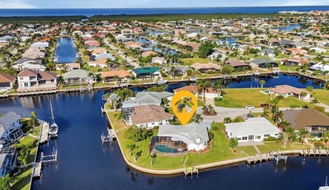 SENSATIONAL! WATER-VIEW, LUXURY REMODEL, SUNNY HEATED POOL, HUGE 145’ SEA WALL