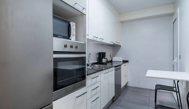 Serene 3-bedroom apartment with AC in vibrant Barcelona