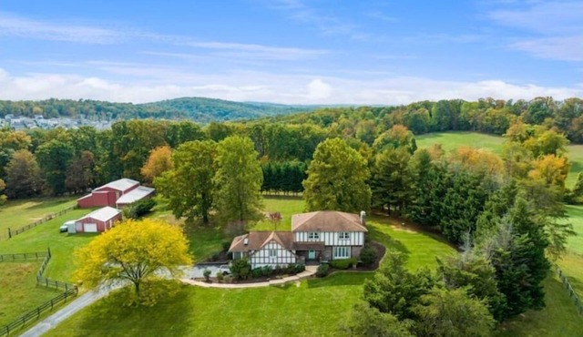 Serene 51-Acre Estate with Beautiful Farmhouse-Your Nature Retreat Awaits!