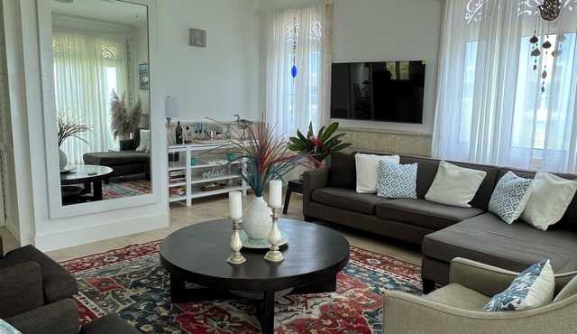 Serene and Spacious Beachfront Condo with Pool. Amazing views. Gated security.