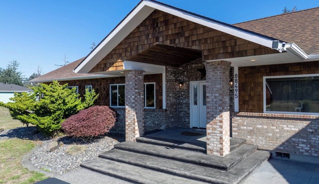Serene coastal ambiance, fenced yard, fire pit, and outdoor furniture!