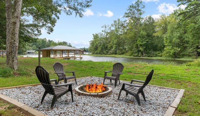 Serene Cove at Lake Sinclair on 4+ acres with Covered Deck & Covered Dock