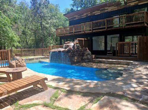 Serene Forest Retreat Home with Waterfall Pool, Creek & canoe Access near Houston, Grimes County, Texas