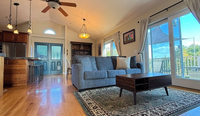 Serene furnished apt for 30+ days with views, balconies, steam, WiFi, peloton.