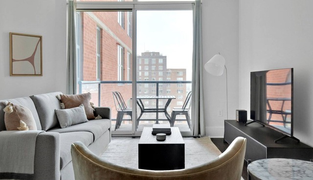 Serene Jersey City 2BR w/ W/D, Gym, DM & PATH shuttle, by Blueground