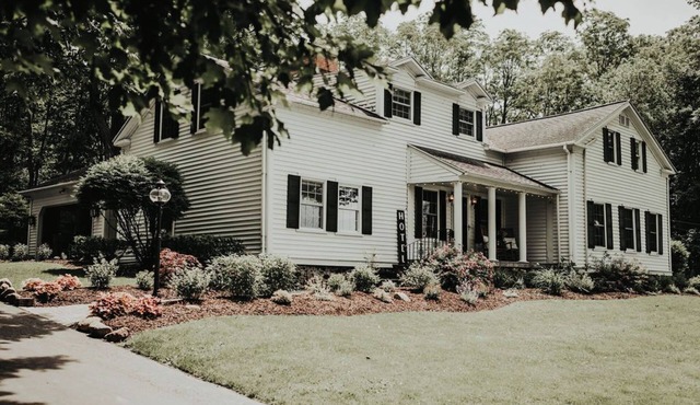 Serene Lake View 5-bedroom, 5 Bath Farmhouse in Charming Skaneateles