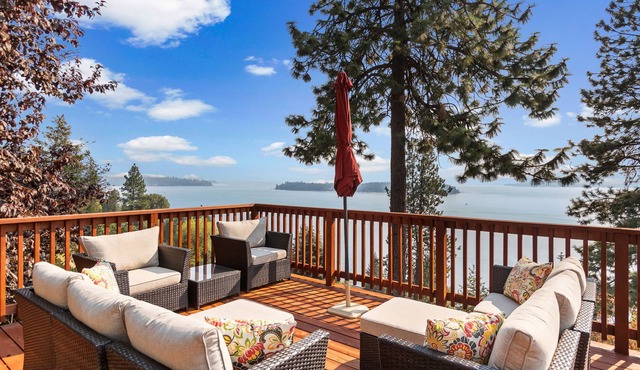 Serene lake-view retreat with deck, grill, firepit, & fireplace