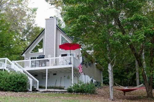 Serene Lakefront Home with Hot Tub and Boat for Rent!