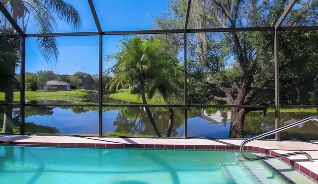 Serene Lakefront Oasis with Stunning Waterfront View & Screened Pool – Sleeps 9