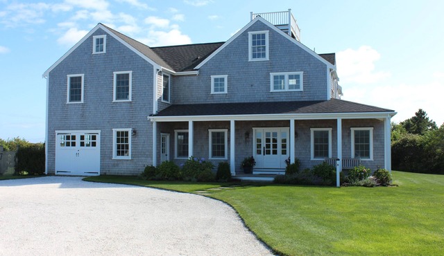 Serene oasis that abuts 500 acres of conservation land near a secluded beach.