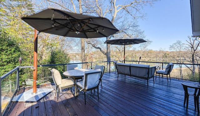Serene, riverfront home with deck, balcony, kitchen & fireplace - dog-friendly