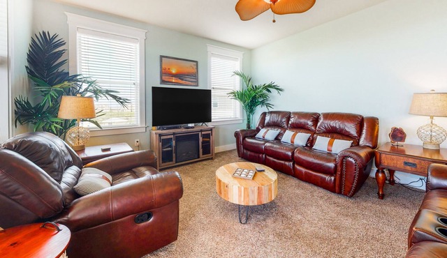 Serene waterfront condo with pool, hot tub, game room & washer/dryer