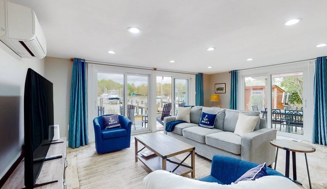 Serene waterfront home with kayaks, paddle board, grill, firepit, W/D, and AC