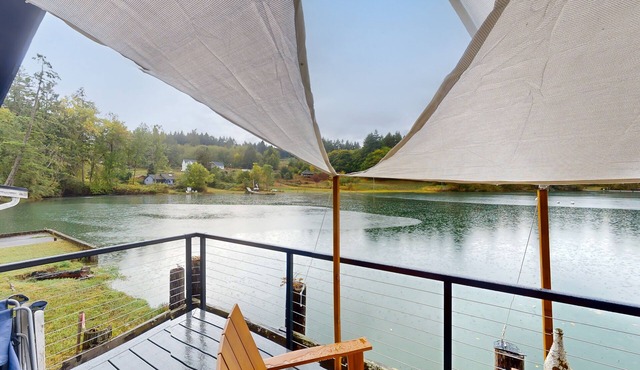 Serene waterfront home with gorgeous deck & views of the cove/mountains