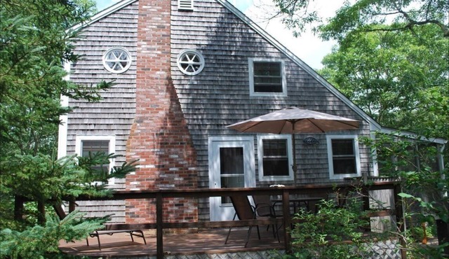 serene wooded 3-bedroom house West Tisbury deck, screen porch and outdoor shower