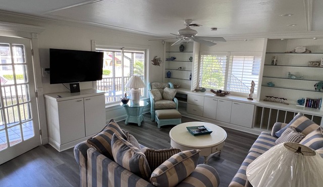 Serenity at its finest. Waterfront Paradise overlooking playful dolphins