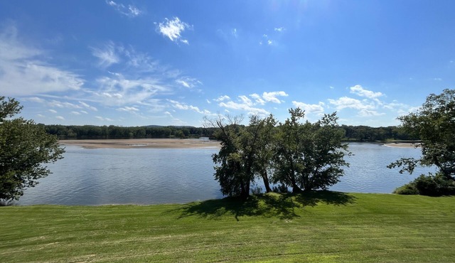 Serenity awaits at this secluded riverfront property