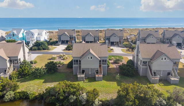 Serenity By The Sea - Community Pool, Steps to Beach, King Suite & Bunk Room